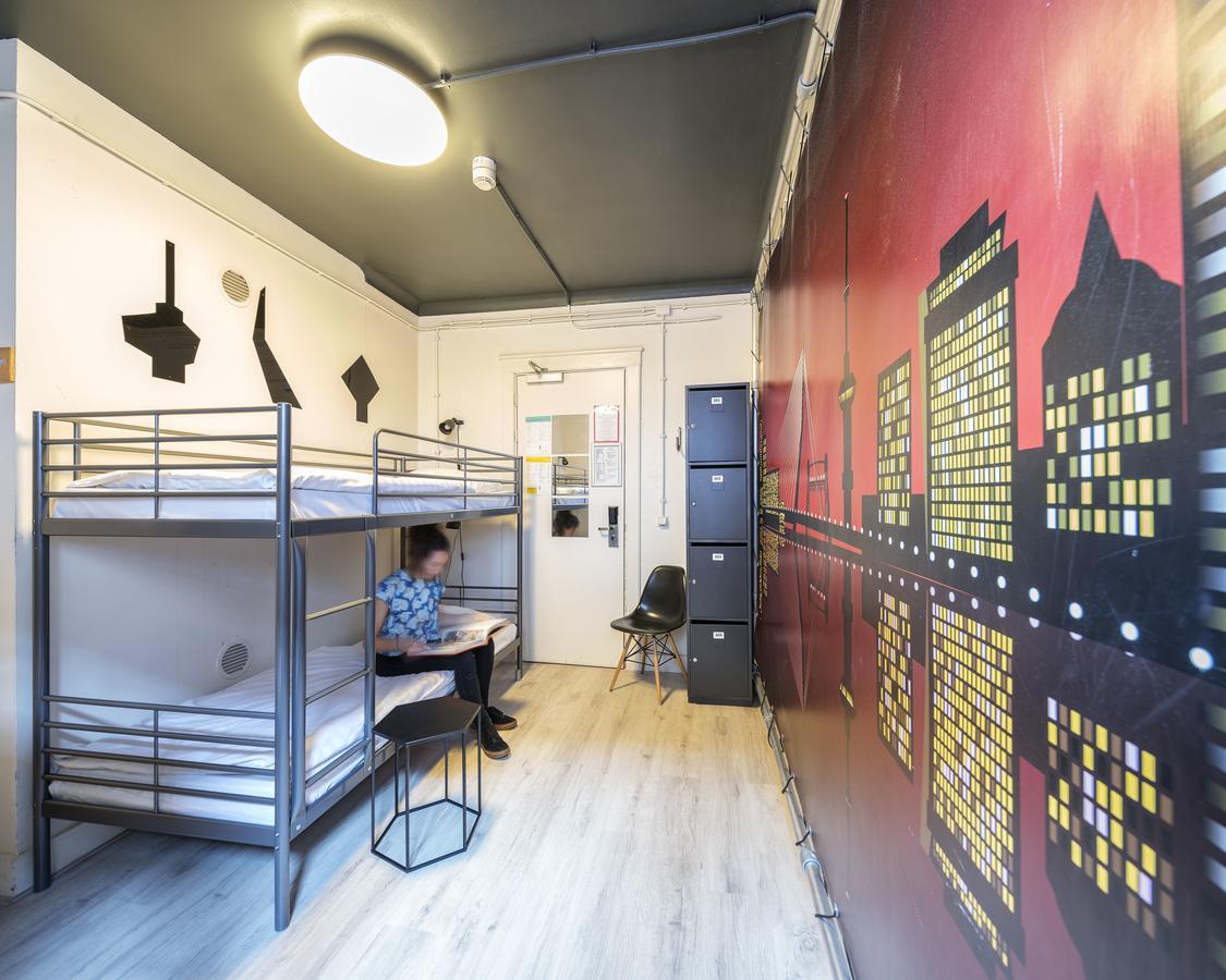 Bett im 4-Bett-Schlafsaal mit Gemeinschaftsbad